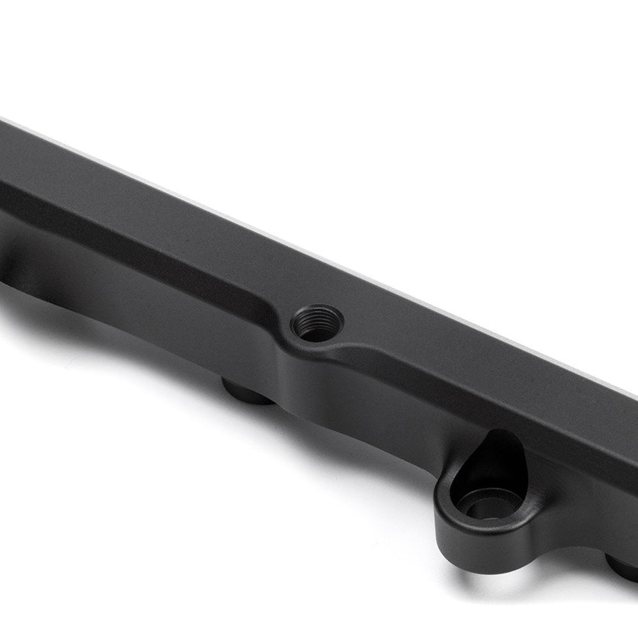 Detail view of gauge port on Fuel Rail in Satin Black Anodized Finish for Honda K-Series 